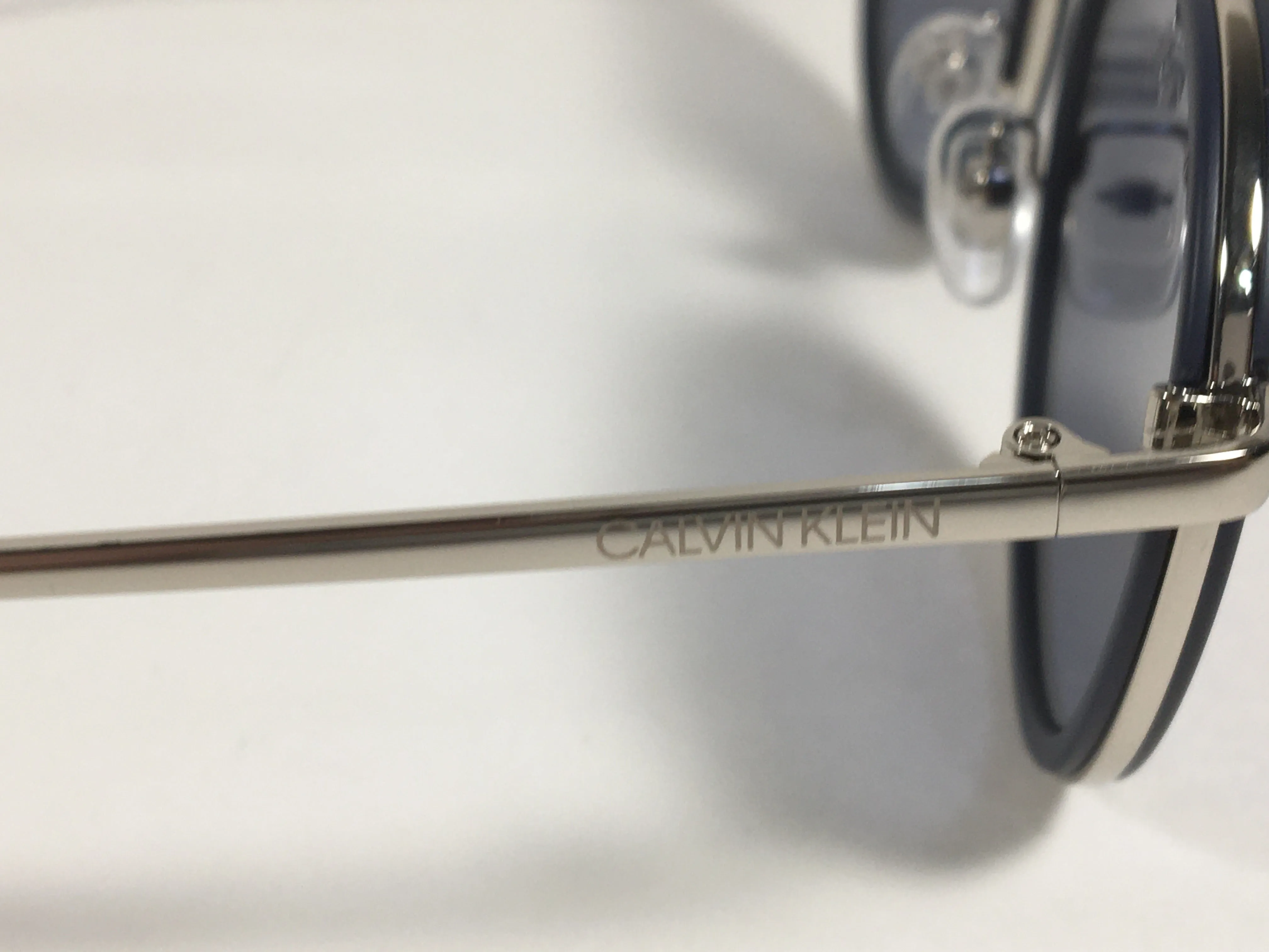Calvin Klein CK19131S 410 Round Sunglasses Navy Blue And Silver Frame Gray Lens