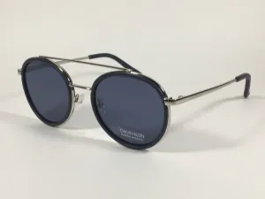 Calvin Klein CK19131S 410 Round Sunglasses Navy Blue And Silver Frame Gray Lens