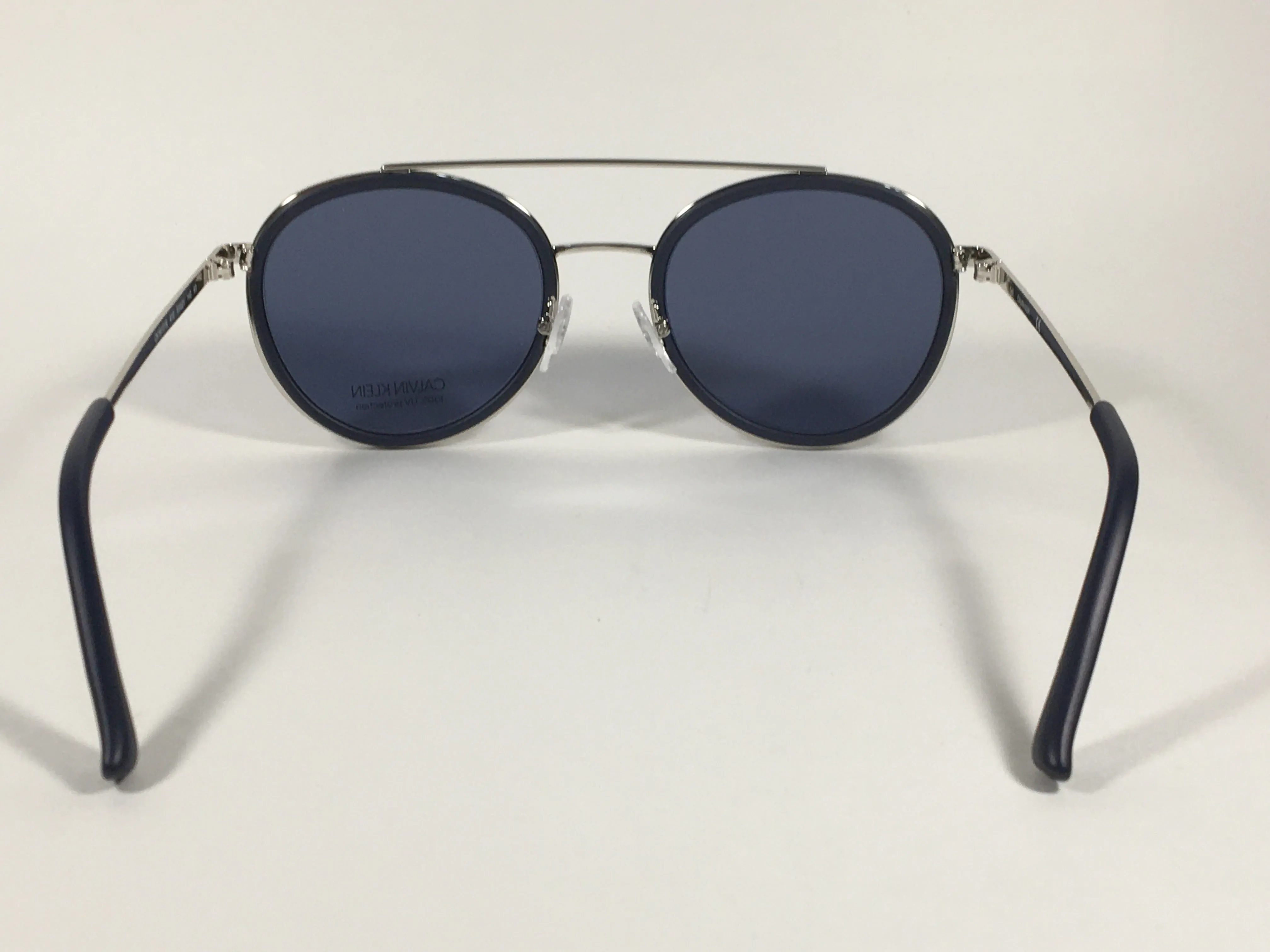 Calvin Klein CK19131S 410 Round Sunglasses Navy Blue And Silver Frame Gray Lens