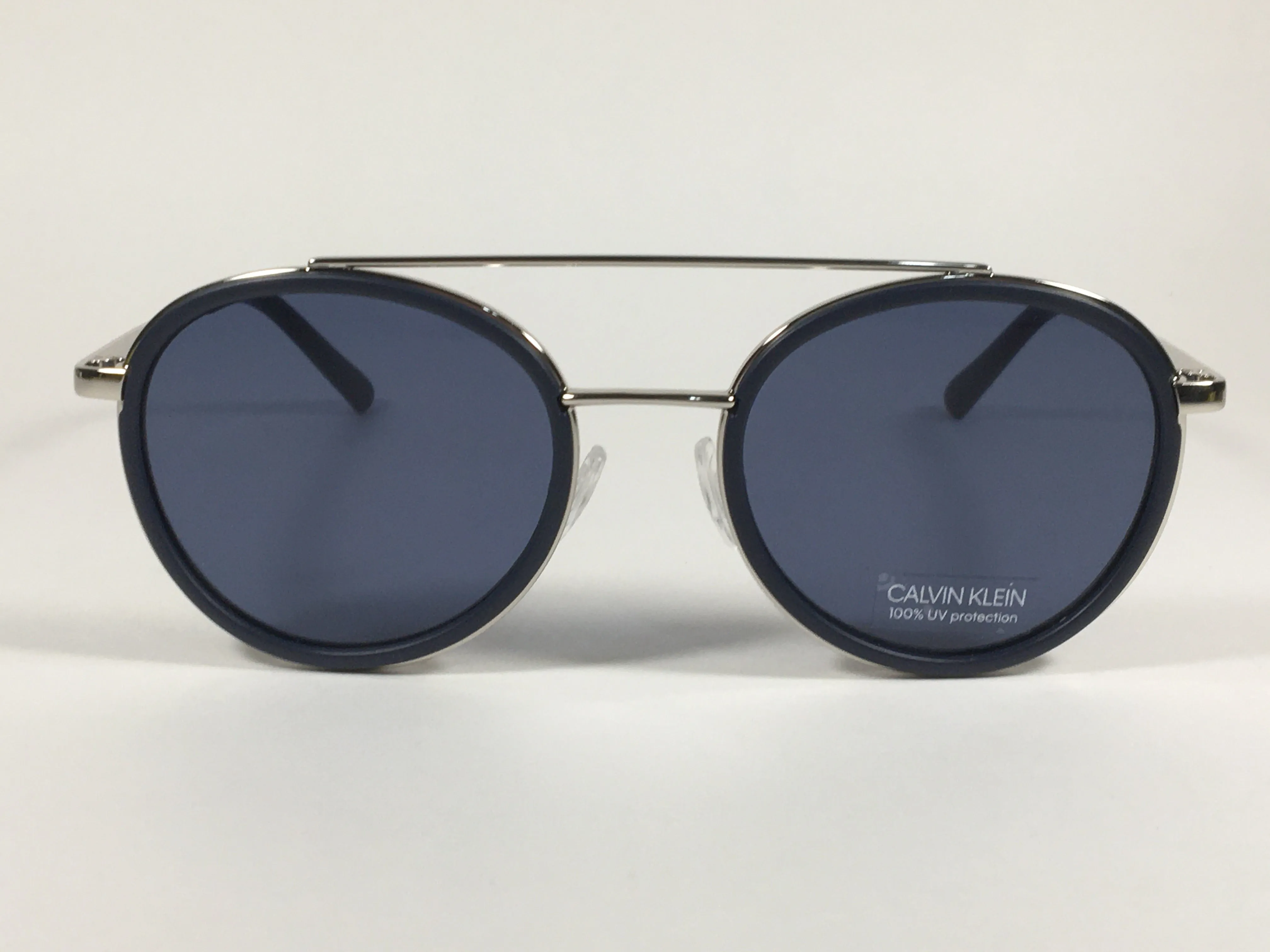 Calvin Klein CK19131S 410 Round Sunglasses Navy Blue And Silver Frame Gray Lens