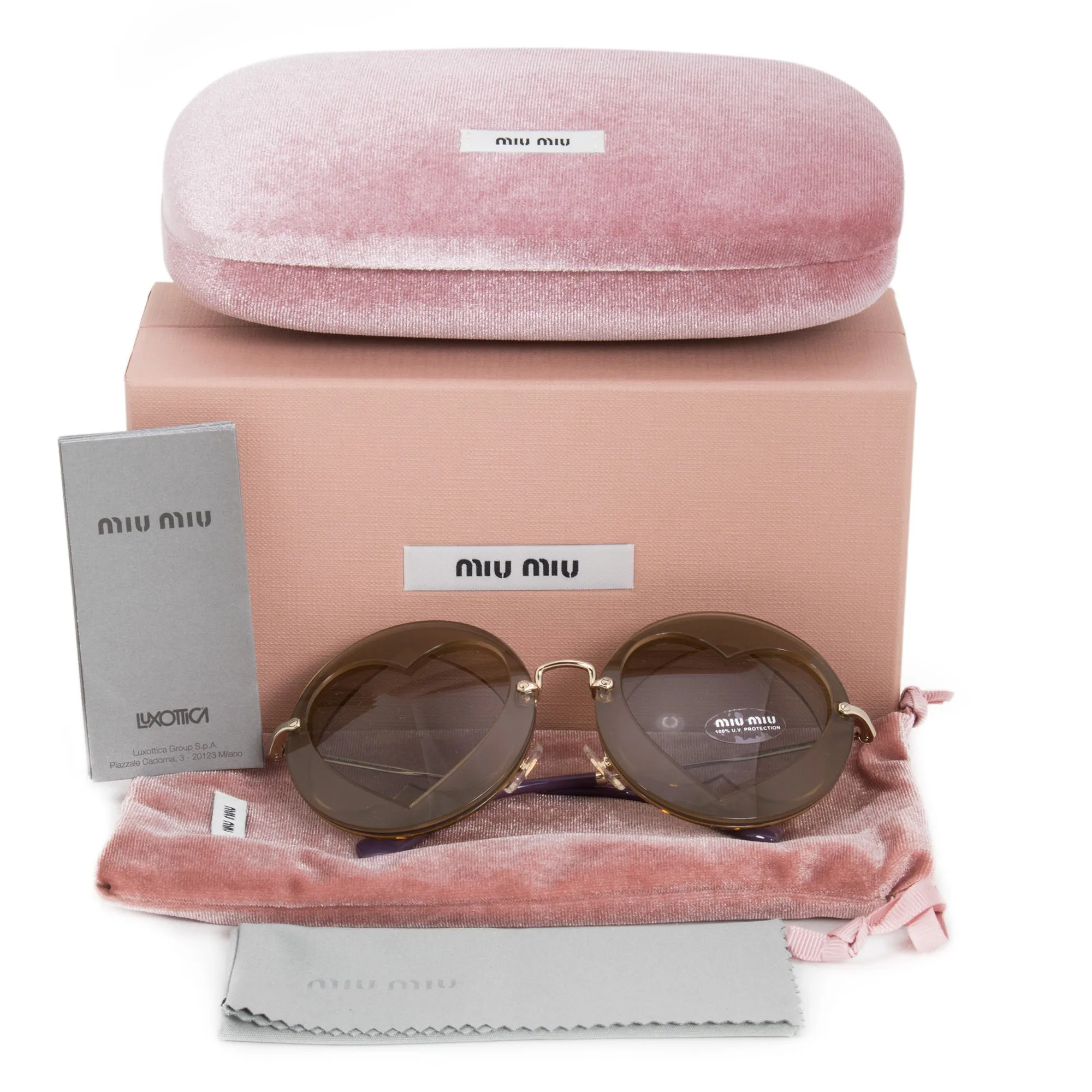 Miu Miu Round Sunglasses SMU01SS VA25J2 62