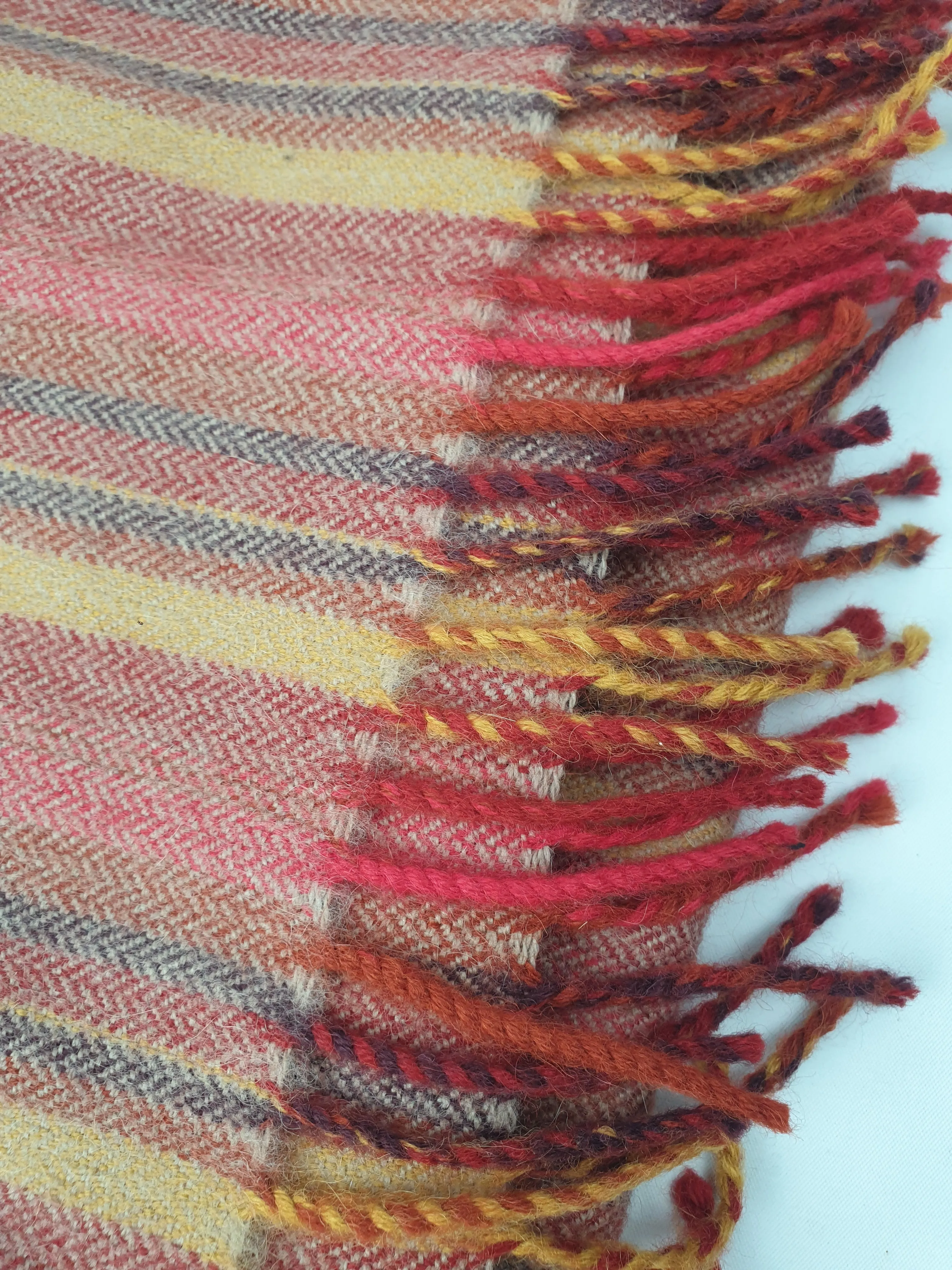 Red-toned striped wool scarf